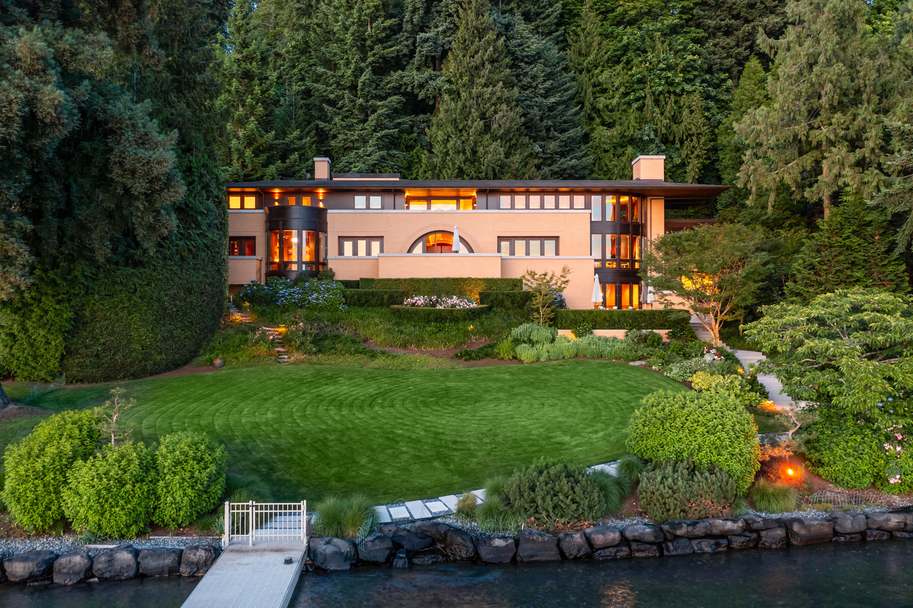 The residence at last light, seen from Lake Washington